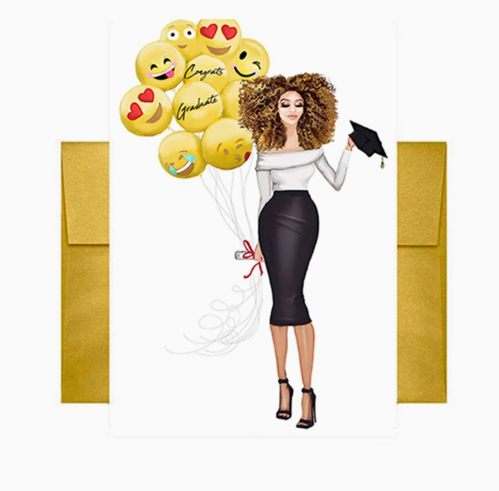 White greeting card with illustration of a woman holding a black graduation cap in 1 hand and a bunch yellow ballons some with emoji faces, graduate, and congrats printed and a metallic gold envelope on a white background.