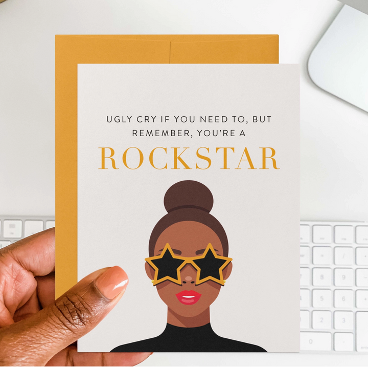 Greeting card with illustration of a woman wearing star-shaped sunglasses and text &