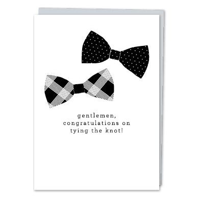 White greeting card with 2 black-and-white bowtie illustrations and text that reads "Gentlemen, Congratulations on tying the knot!" Paired with a metallic silver envelope on a white background.