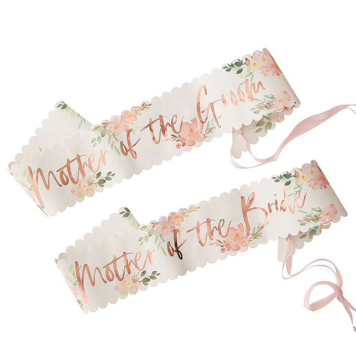 Two paper sashes with floral patterns and &