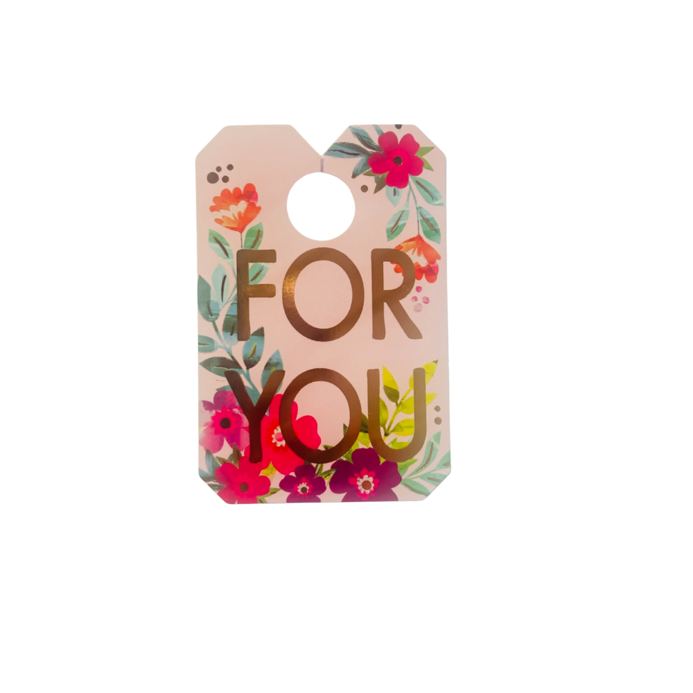 Blush pink beard clip style gift tag with multi-color floral allover print and a rose gold foil print that reads FOR YOU