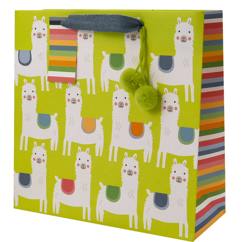 allover llama print with colorful saddles on a lime green gift bag, lime green pom-poms accent, a multi-color stripe side panels and gift tag 