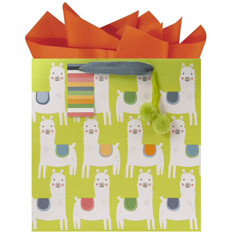 allover llama print with colorful saddles on a lime green gift bag, lime green pom-poms accent, a multi-color stripe gift tag and orange tissue paper