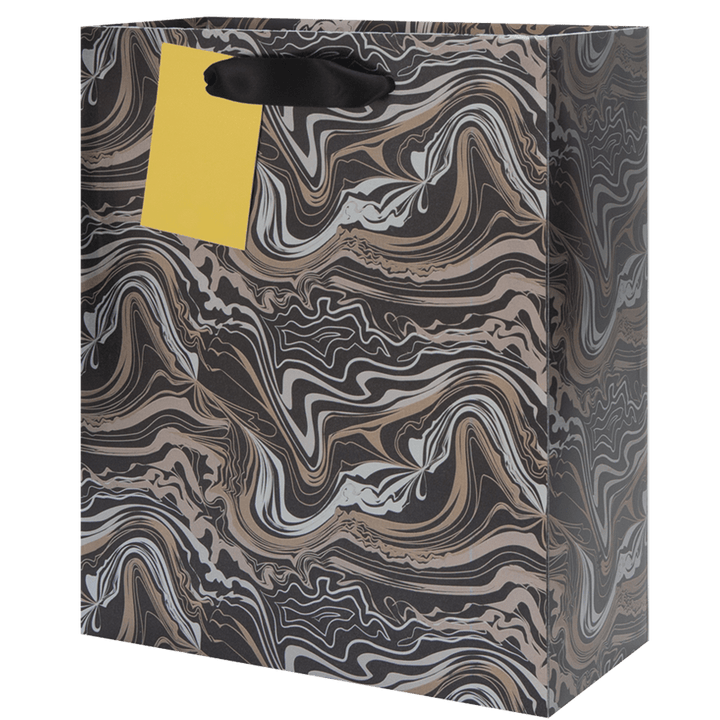 Black gift bag with marble print pattern in metallic champagne and gold colors with a black satin ribbon handle. Gold metallic gift tag