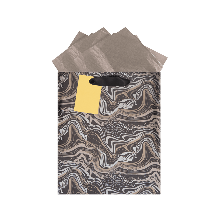 Black gift bag with marble print pattern in metallic champagne and gold colors with a black satin ribbon handle