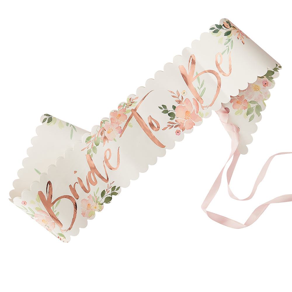 White sash with pink and green floral print, bride to be in rose gold metallic print
