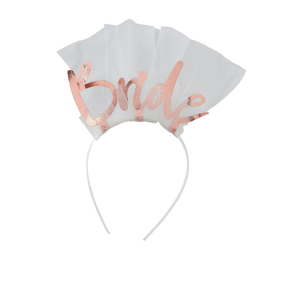 White headband wrapped in white tulle with bride in rose gold individual letters on top
