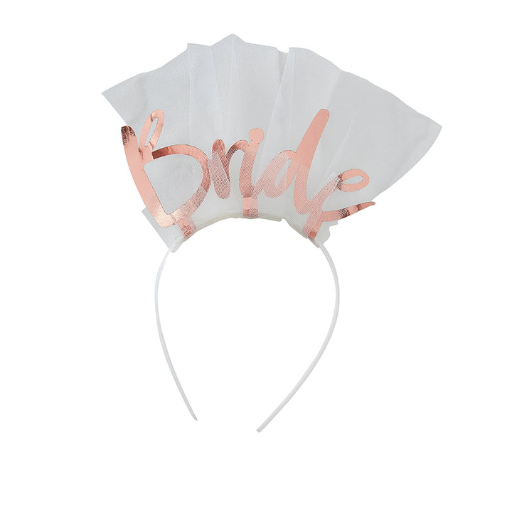 White headband wrapped in white tulle with bride in rose gold individual letters on top
