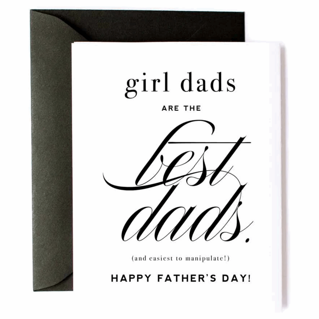 White greeting card with black lettering, text reads “Girl dads are the best dads. (And easiest to manipulate!) Happy Father’s Day!” Paired with a black envelope