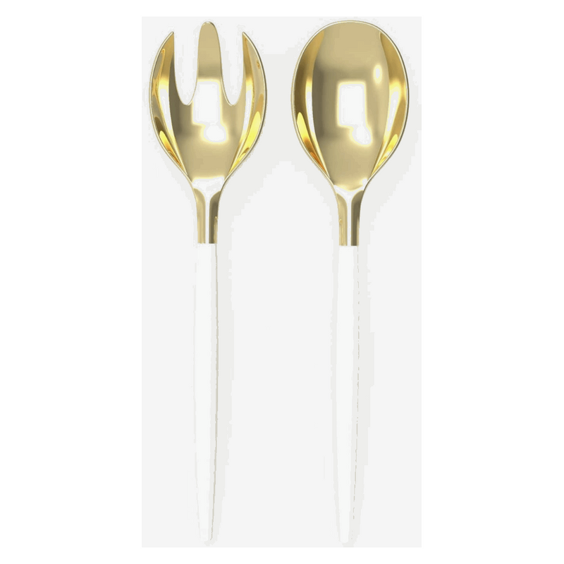 White background, white-handled salad serving set with gold tops. 1 salad serving fork next to 1 salad serving spoon