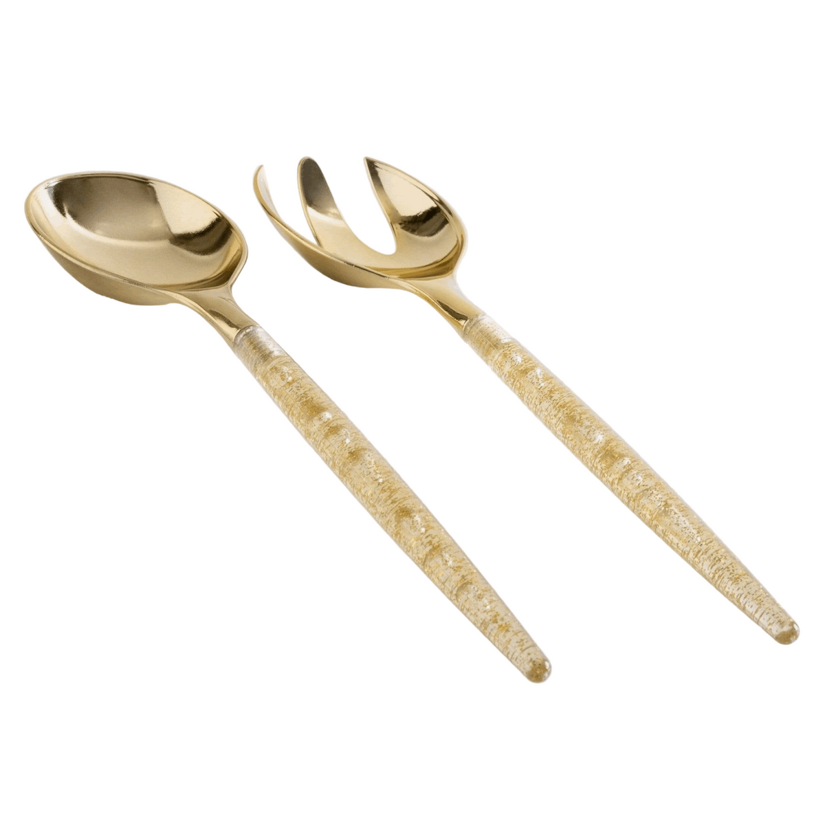 White background, a side view of glitter-filled, clear-handled salad serving set with gold tops. 1 salad serving fork next to 1 salad serving spoon