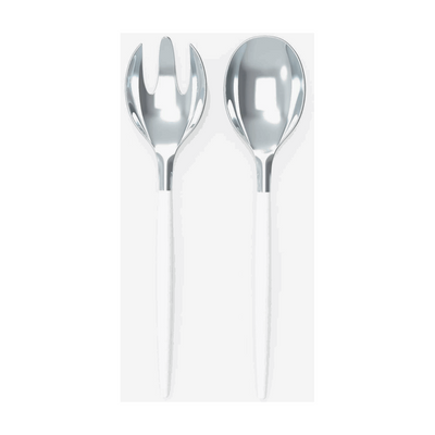 White background, white handled salad serving set with silver tops. 1 salad serving fork next to 1 salad serving spoon