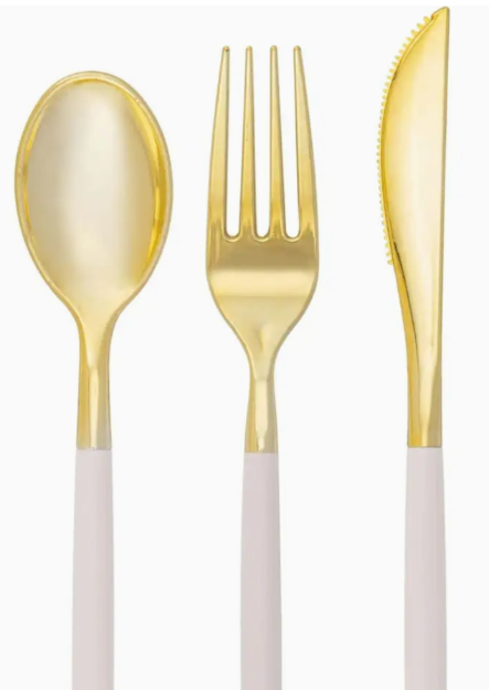 A set of two-tone utensils with linen (a light taupe) color handles with gold heads, including 1 fork, 1 spoon, and 1 knife.