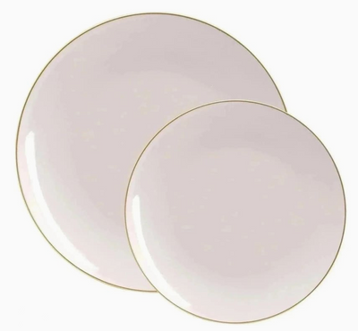 Two pinkish beige colored plates with gold rims on a white background