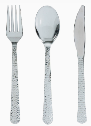Set of silver flatware with hammered textured handles on a white background