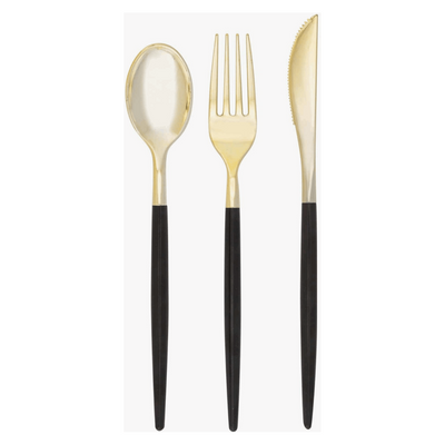 White background, black-handled and gold flatware set of 1 spoon, 1 fork, and 1 knife laid out next to each other.