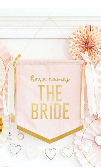 A canvas wall banner with the text &