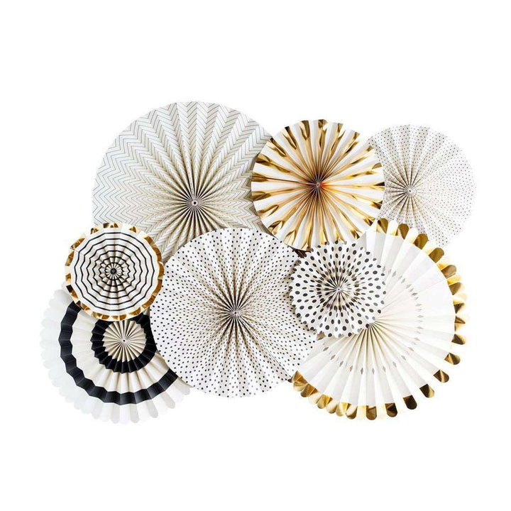 A set of elegant paper fans with black, cream, and gold patterns in varying sizes and print patterns.