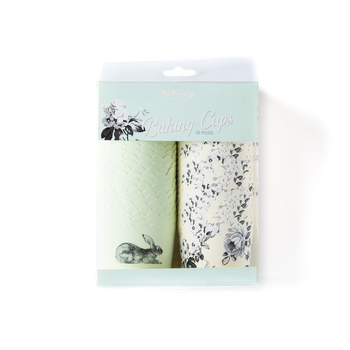 Package of a stack of Tiffany blue and cream cupcake cup with a black rabbit printed on it and a stack of cream cupcake cup with black floral print