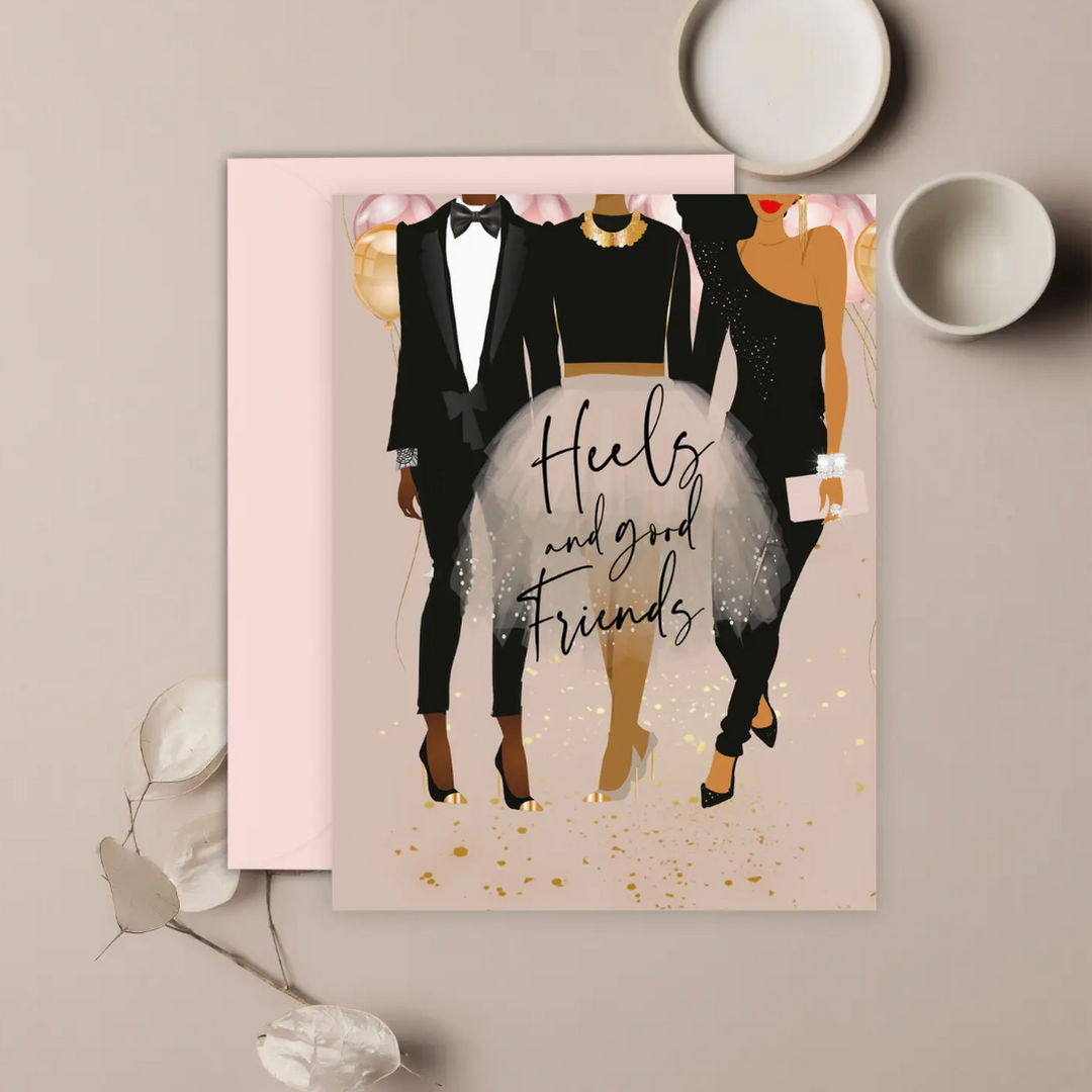 A greeting card with an illustration of three stylized women wearing black-tie party outfits and heels. The text on the card reads &