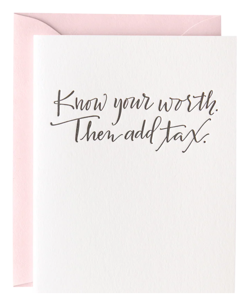 White greeting card with black text "Know your worth. Then add tax." Paired with a blush pink envelope