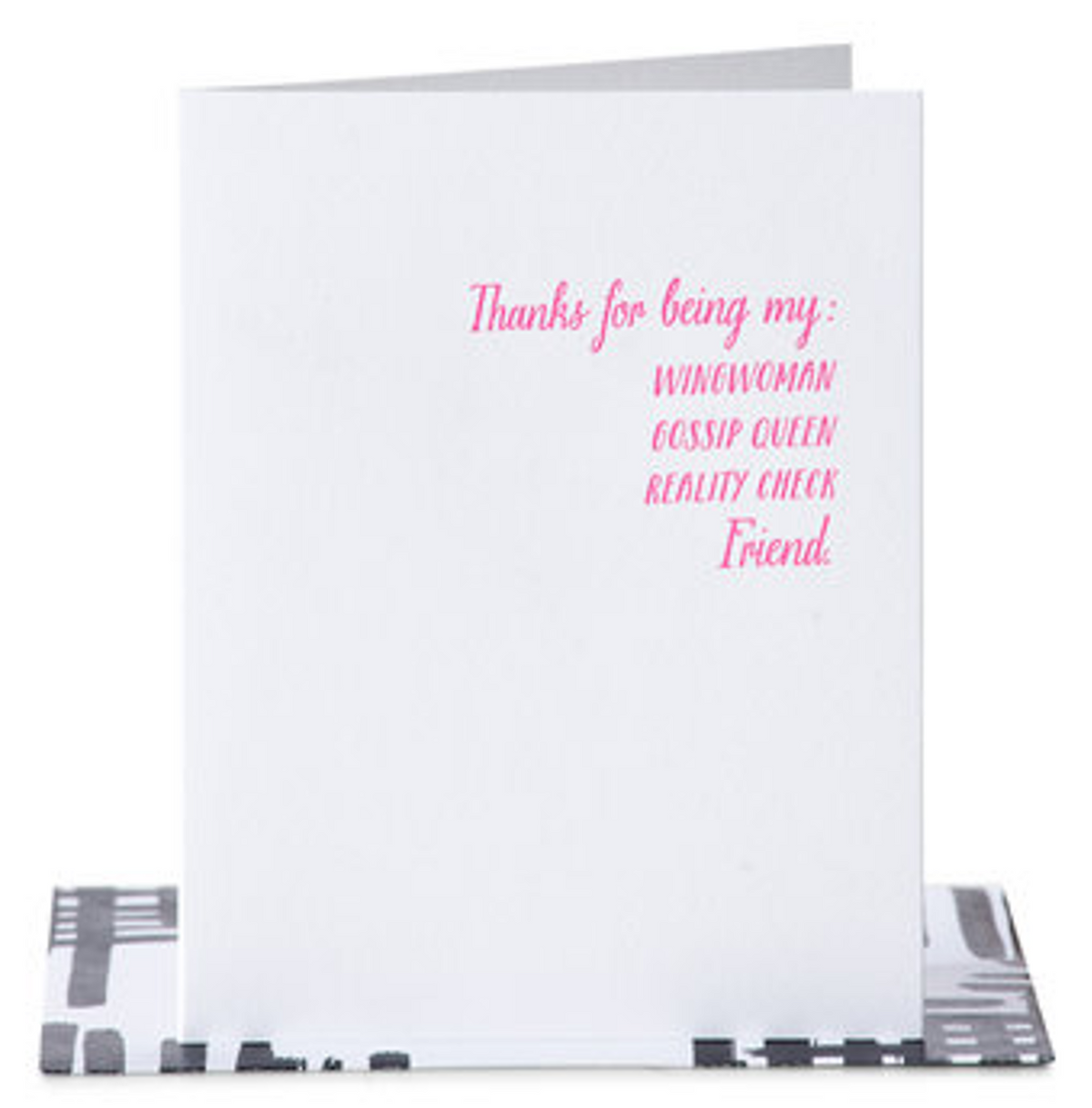 White greeting card with neon pink text that reads thanks for being my: wingwoman gossip queen reality check friend. Paired with a black and white envelope
