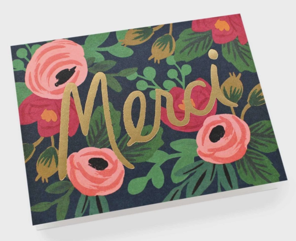 Navy-colored Greeting card with floral design and 'Merci' text in gold foil