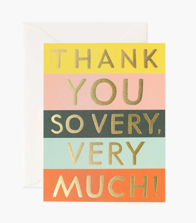 Yellow, blush, black, sage, and orange striped greeting card with large gold foil text that reads "thank you so very, very much!" with a white envelope