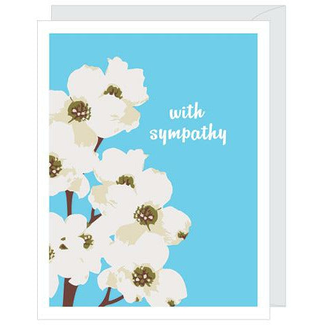 Blue greeting card with an illustration of dogwood branches and flowers and white text that reads with sympathy and a white envelope