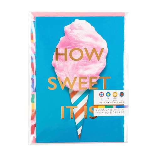 A packaged teal greeting card with an image of cotton candy on a teal, red, and white striped cone, and gold-foil text "ow Sweet It Is"