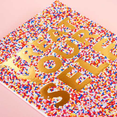 Colorful greeting card with the text "Treat Yourself" in large gold foil print