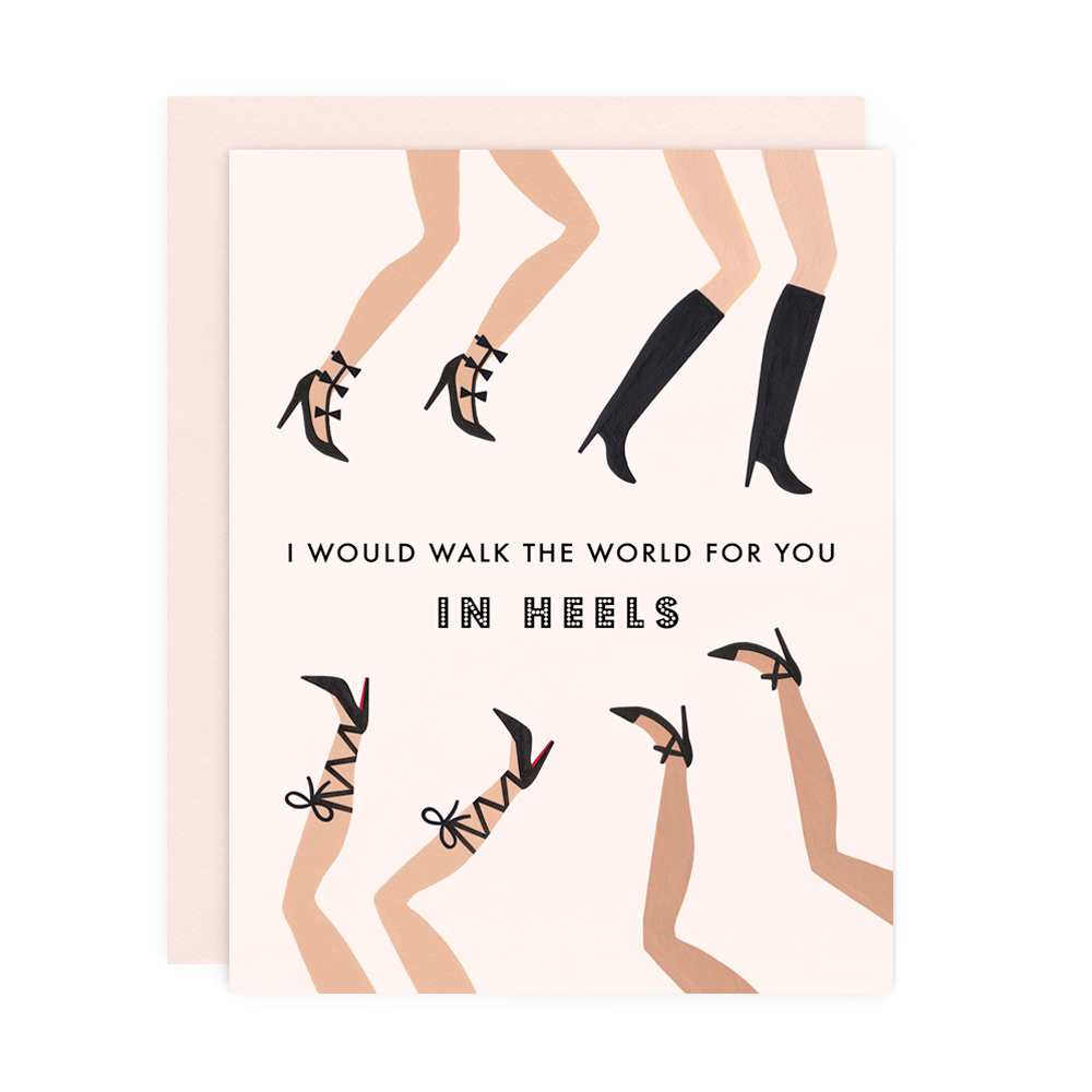 Pink greeting card featuring illustrations of 4 pairs of legs with different style high-heeled shoes and the text "I WOULD WALK THE WORLD FOR YOU IN HEELS with a pink envelope.