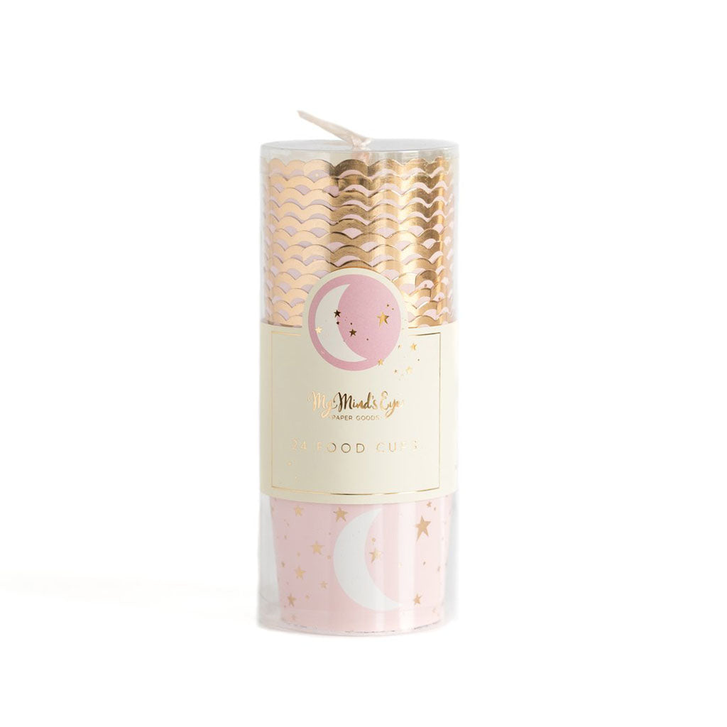 A package of paper baking cups. The cups are stacked in plastic tube with a cream ribbon, pink color with a white printed moon and all over gold stars