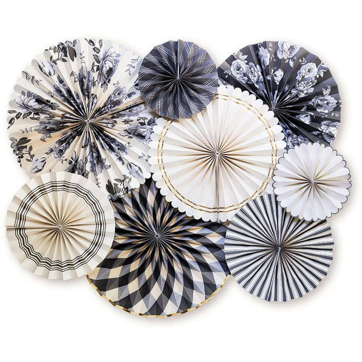 A collection of decorative paper fans with various patterns, including plain, striped, floral, and checkered designs in black, white, gray, and gold colors.