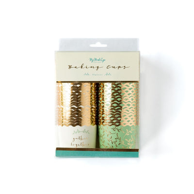 A picture of a package containing a sage green baking cup with a printed gold foil all-over floral pattern and rim, and a white baking cup with printed sage green florals and gold foil words that read "gather together".