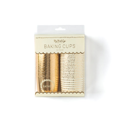 Picture of the package of gold foil and white treat cups with a wreath design and the word 'Gather' in white, and white treat cups with allover gold foil dot print pattern.