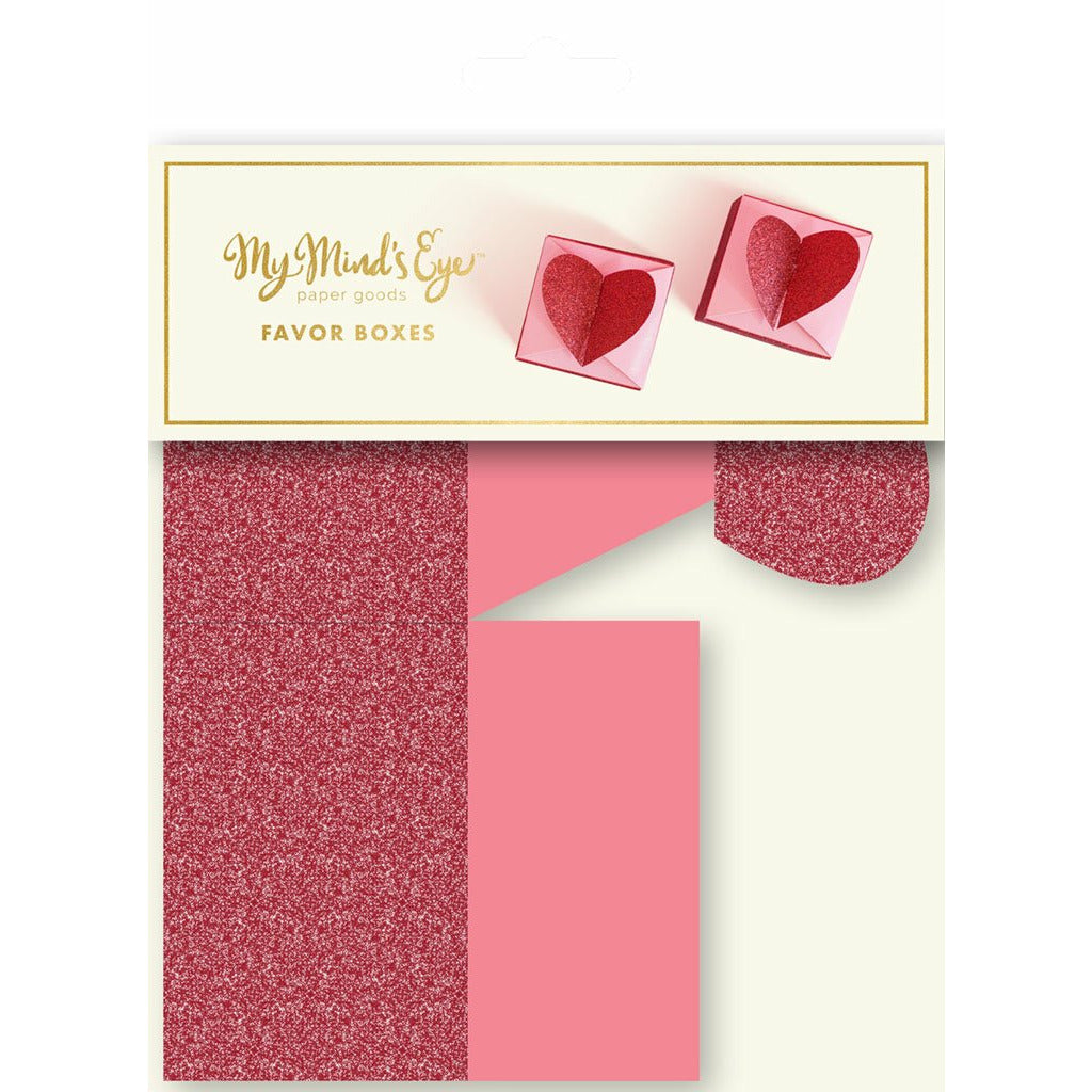 Picture of the packaged, unassembled pink and glittery red square favor box topped with a 3D glitter red heart-shaped closure. 