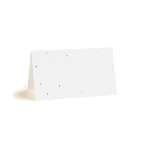 A white place card with a silver foil printed dot pattern, displayed in a tent-style fold.